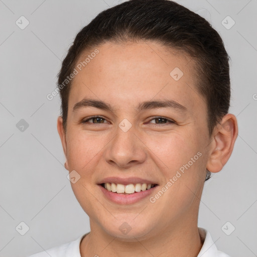 Joyful white young-adult female with short  brown hair and brown eyes