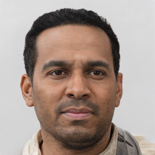 Neutral latino adult male with short  black hair and brown eyes