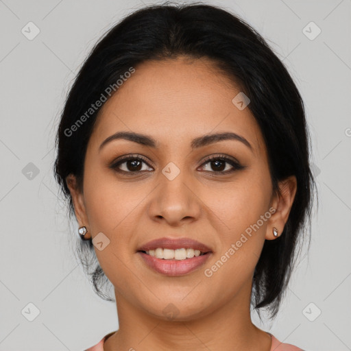 Joyful latino young-adult female with medium  brown hair and brown eyes