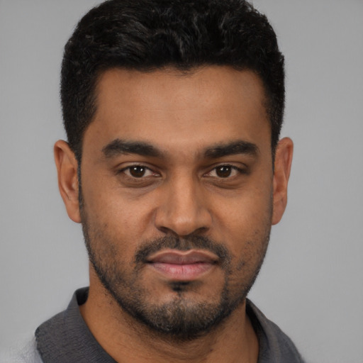 Neutral black young-adult male with short  black hair and brown eyes