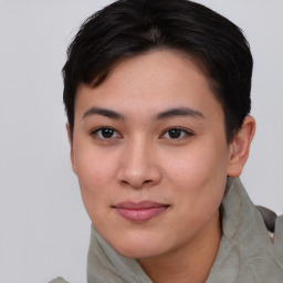 Joyful asian young-adult female with short  brown hair and brown eyes