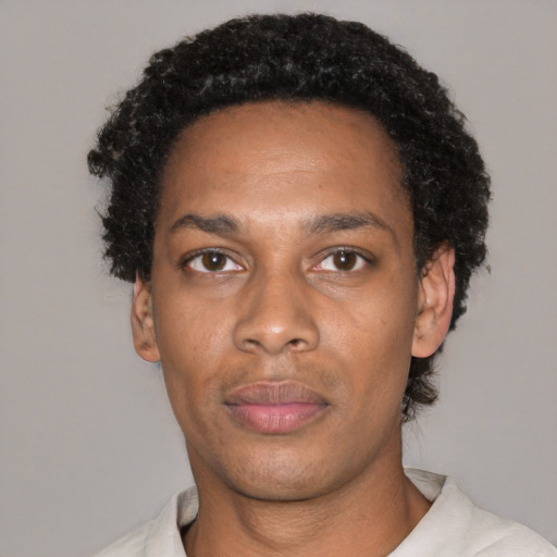 Neutral black adult male with short  black hair and brown eyes
