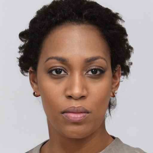 Neutral black young-adult female with short  black hair and brown eyes