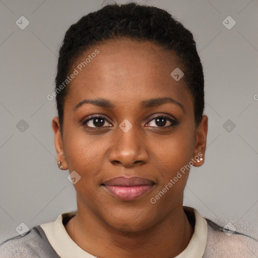 Joyful black young-adult female with short  black hair and brown eyes