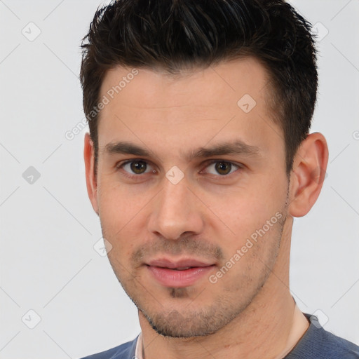 Joyful white young-adult male with short  brown hair and brown eyes