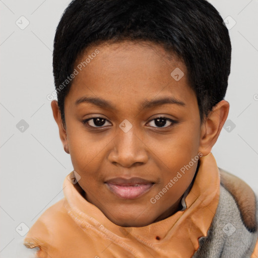 Joyful black young-adult female with short  black hair and brown eyes