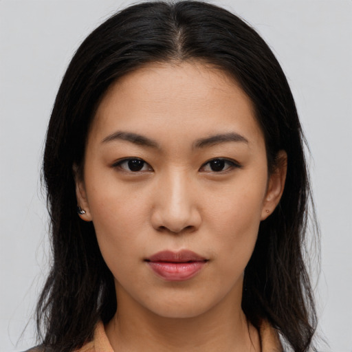 Neutral asian young-adult female with long  brown hair and brown eyes