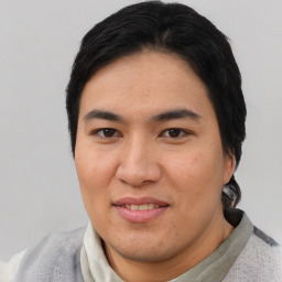 Joyful asian young-adult male with short  brown hair and brown eyes