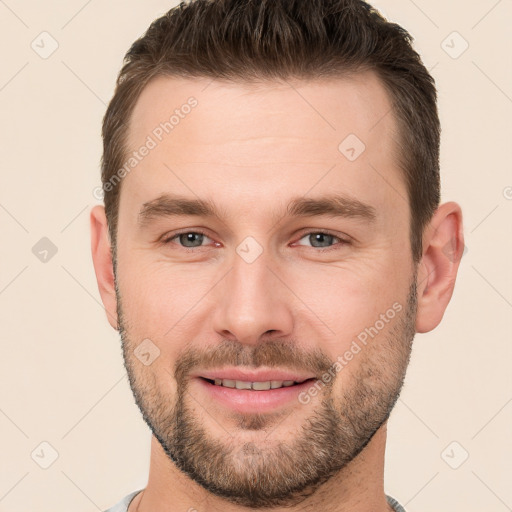 Joyful white young-adult male with short  brown hair and brown eyes