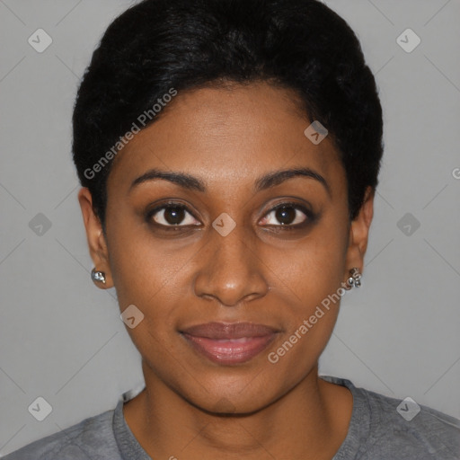 Joyful black young-adult female with short  black hair and brown eyes