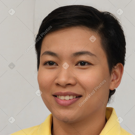 Joyful asian young-adult female with short  brown hair and brown eyes