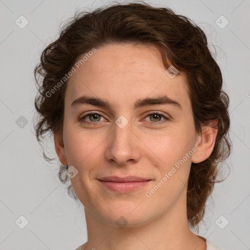 Joyful white young-adult female with medium  brown hair and green eyes