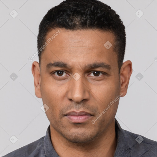 Neutral white adult male with short  black hair and brown eyes