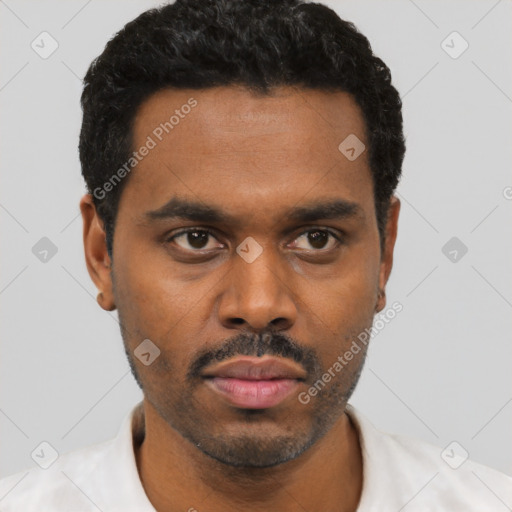 Neutral latino young-adult male with short  black hair and brown eyes