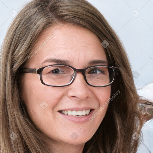 Joyful white young-adult female with long  brown hair and blue eyes