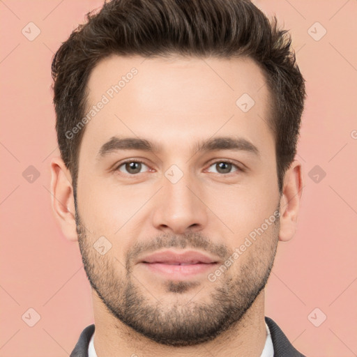 Joyful white young-adult male with short  brown hair and brown eyes