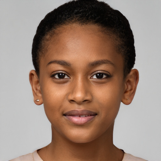 Joyful black child female with short  brown hair and brown eyes