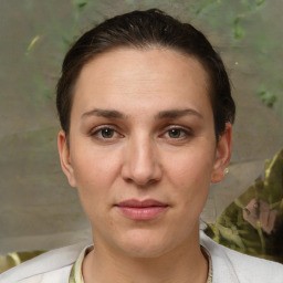 Joyful white adult female with short  brown hair and brown eyes