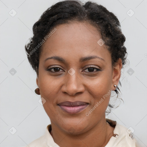 Joyful latino adult female with short  brown hair and brown eyes