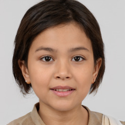 Joyful white child female with medium  brown hair and brown eyes