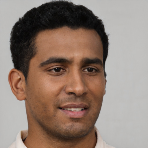 Neutral latino young-adult male with short  black hair and brown eyes
