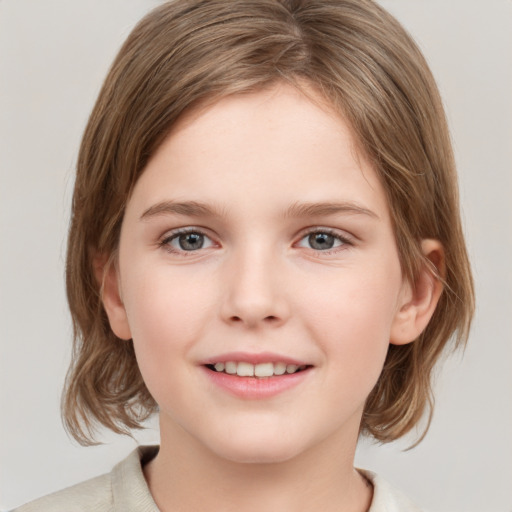 Joyful white child female with medium  brown hair and grey eyes