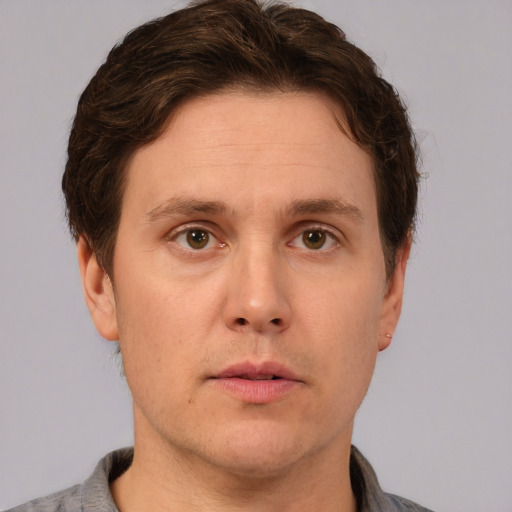 Neutral white adult male with short  brown hair and brown eyes