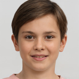 Joyful white child female with short  brown hair and brown eyes