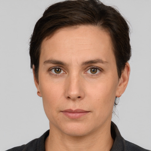 Neutral white adult female with short  brown hair and brown eyes