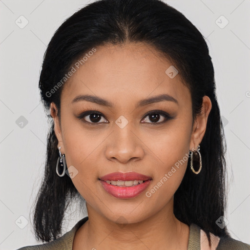 Joyful latino young-adult female with long  black hair and brown eyes