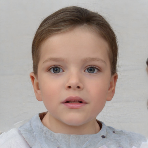 Neutral white child female with short  brown hair and blue eyes