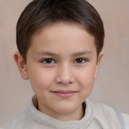 Joyful white child female with short  brown hair and brown eyes