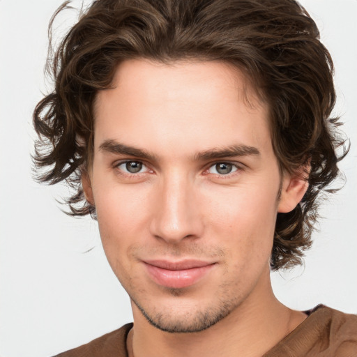 Neutral white young-adult male with medium  brown hair and brown eyes