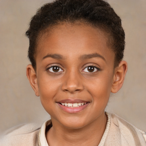 Joyful black child female with short  brown hair and brown eyes