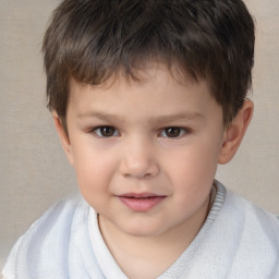 Joyful white child male with short  brown hair and brown eyes