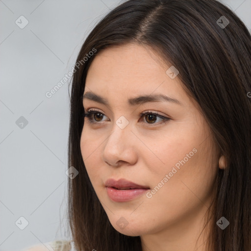 Neutral white young-adult female with long  brown hair and brown eyes