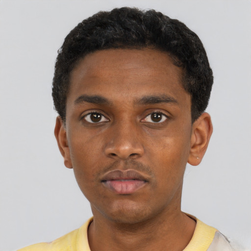 Neutral black young-adult male with short  black hair and brown eyes
