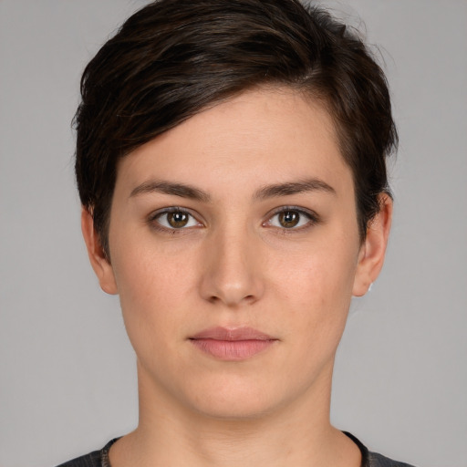 Neutral white young-adult female with short  brown hair and brown eyes