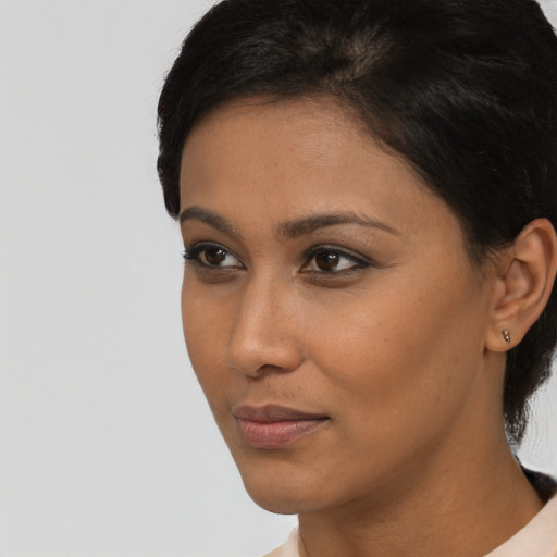 Neutral asian young-adult female with short  black hair and brown eyes