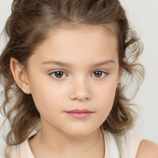 Neutral white child female with medium  brown hair and brown eyes