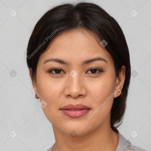 Joyful asian young-adult female with medium  brown hair and brown eyes