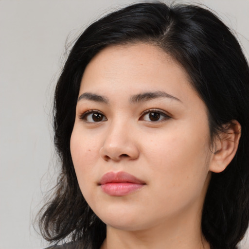 Neutral asian young-adult female with long  black hair and brown eyes