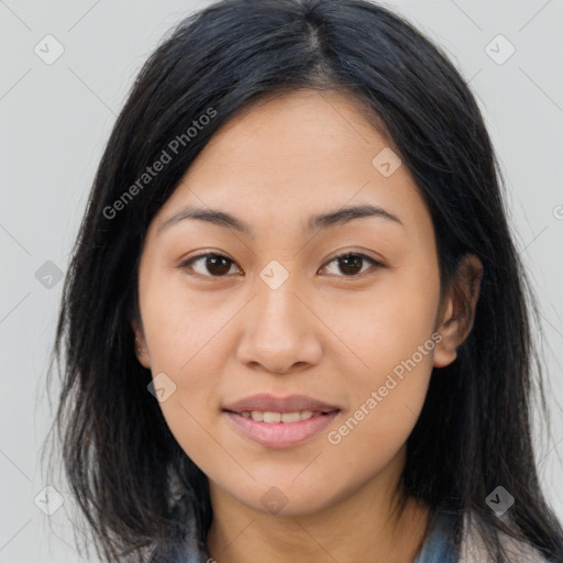 Joyful asian young-adult female with long  brown hair and brown eyes