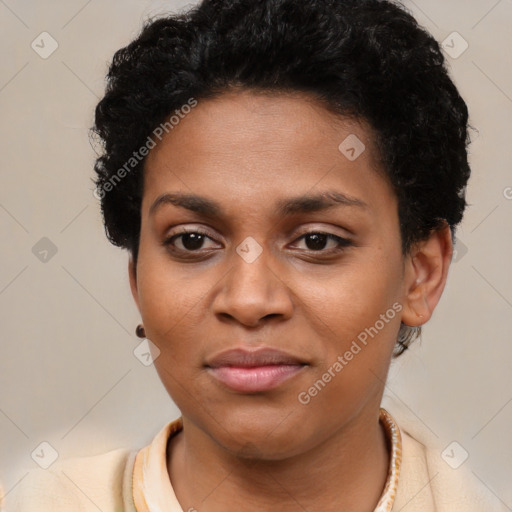 Joyful black young-adult female with short  black hair and brown eyes