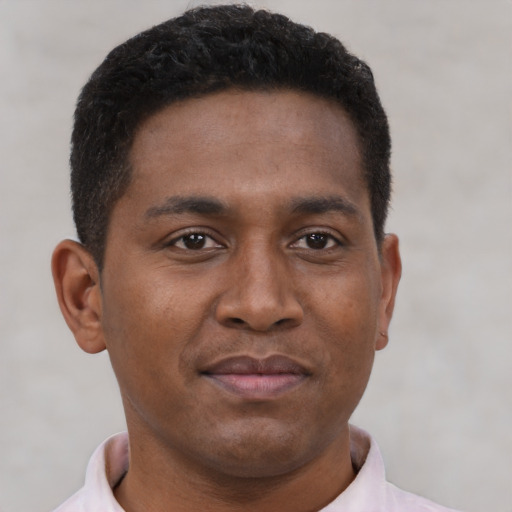 Neutral black young-adult male with short  brown hair and brown eyes