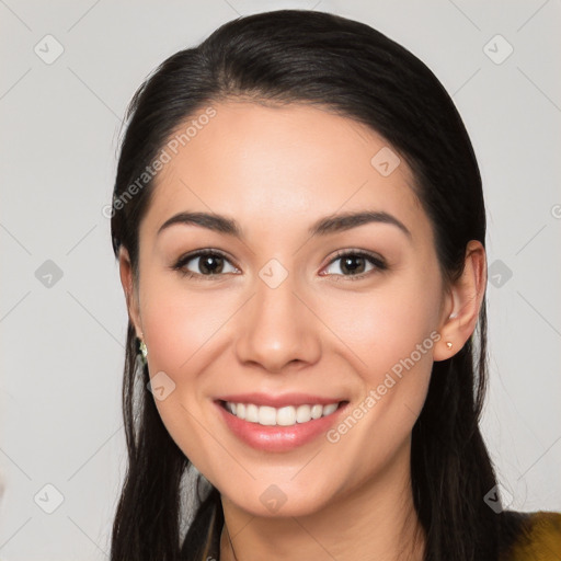 Joyful white young-adult female with long  black hair and brown eyes