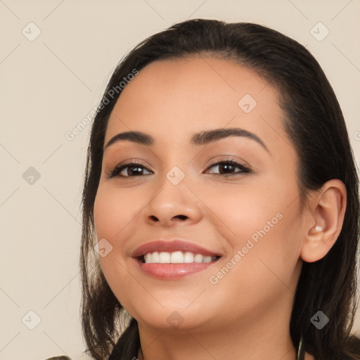 Joyful white young-adult female with long  brown hair and brown eyes