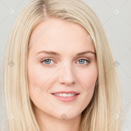 Joyful white young-adult female with long  brown hair and blue eyes