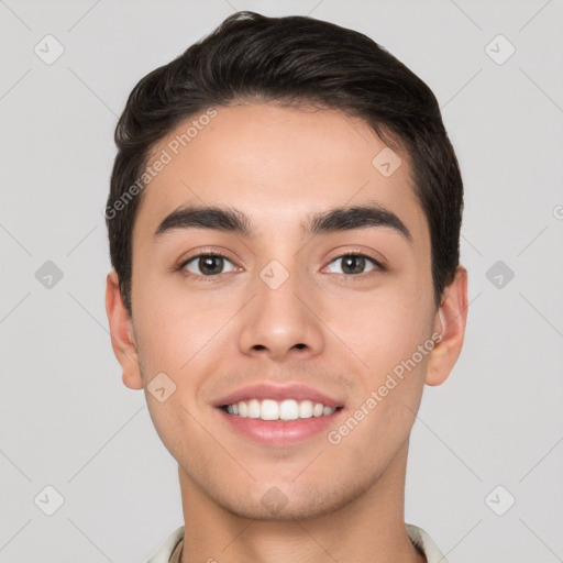 Joyful white young-adult male with short  brown hair and brown eyes