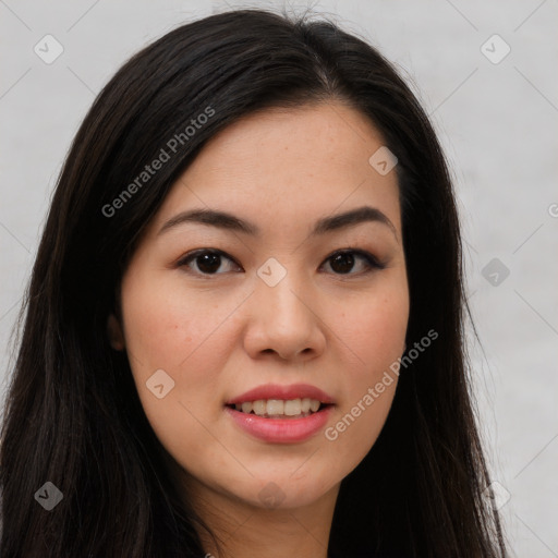 Joyful asian young-adult female with long  brown hair and brown eyes